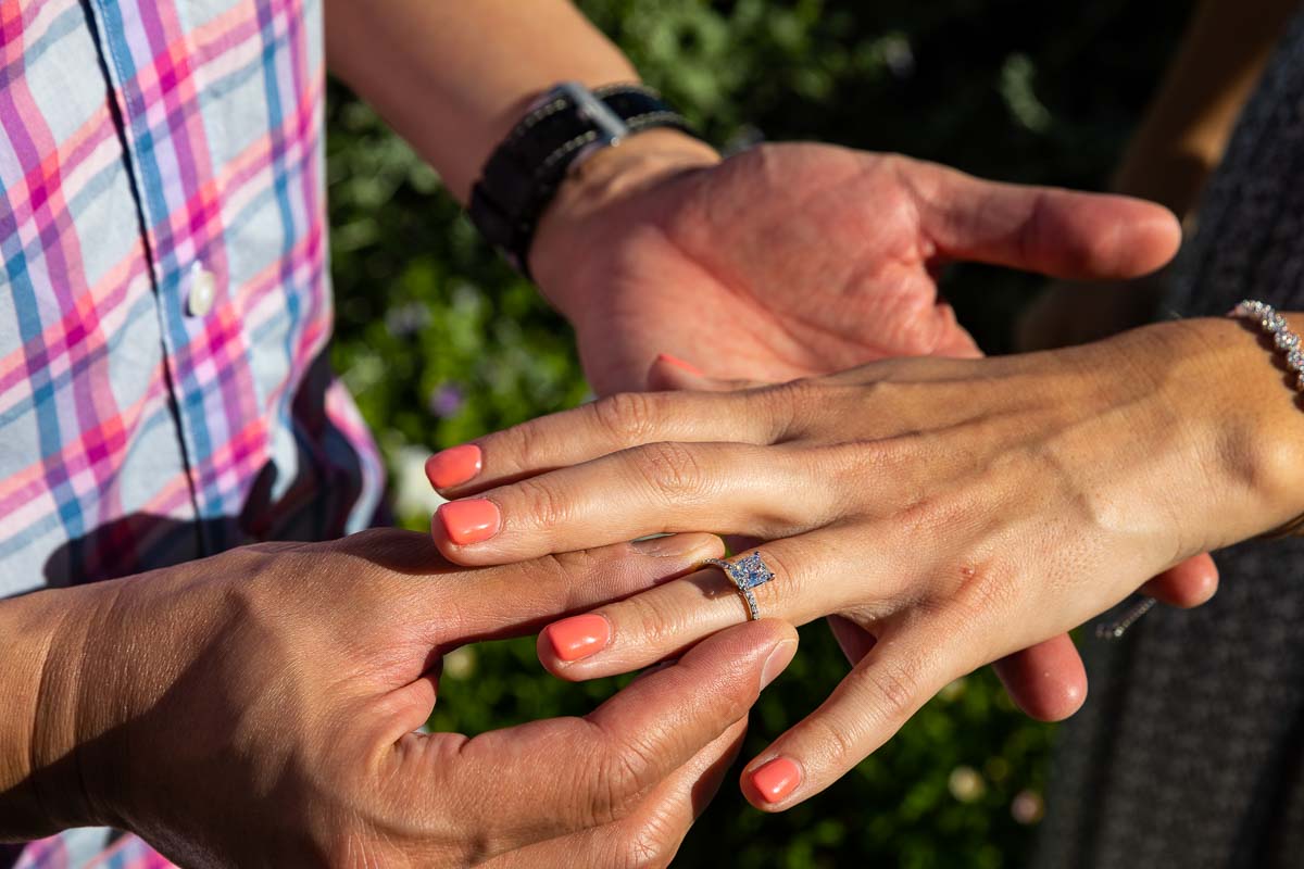 Putting on the engagement ring