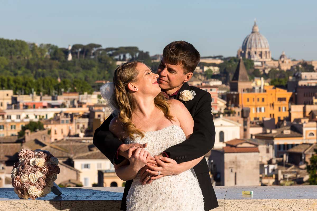 Newlywed portrait picture taken in front of the ancient roman city in the background