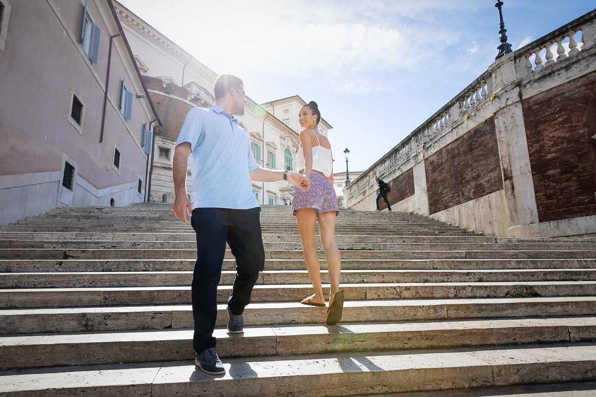 Walking up the steps of a staircase found in the streets of Rome