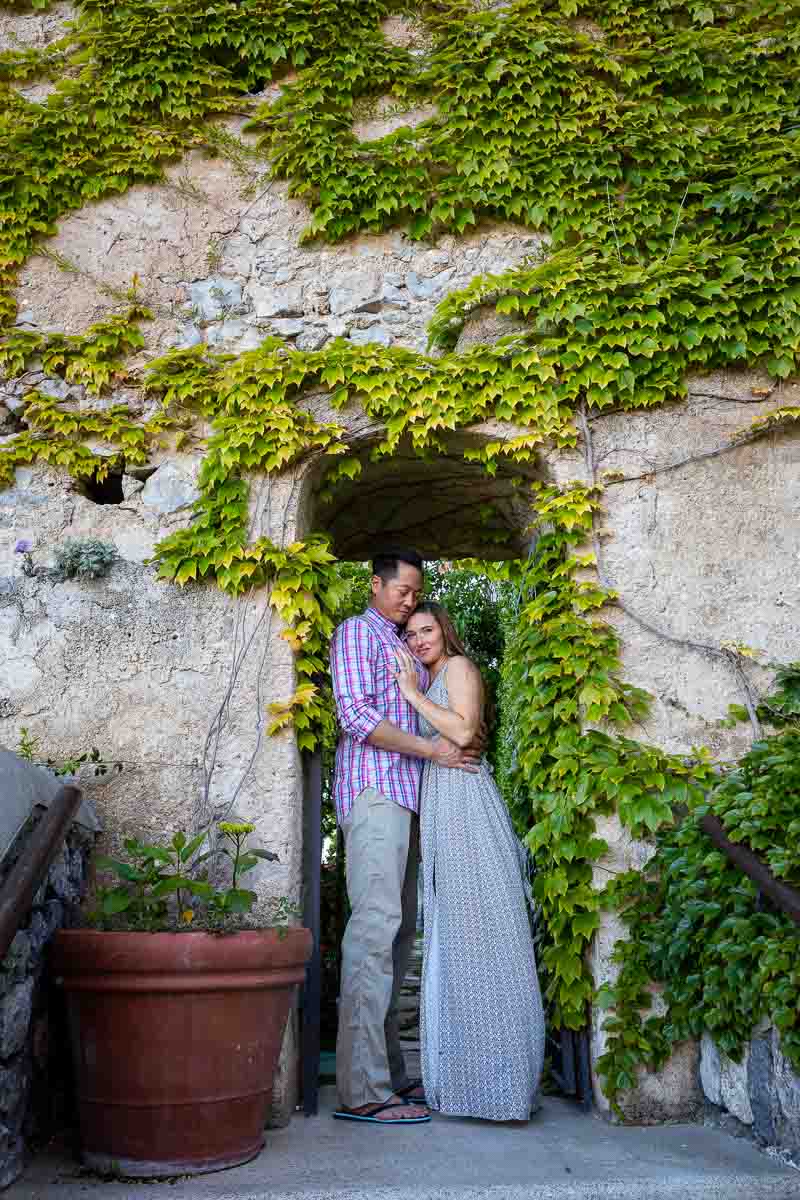 Standing together underneath a doorway with ivy leaves