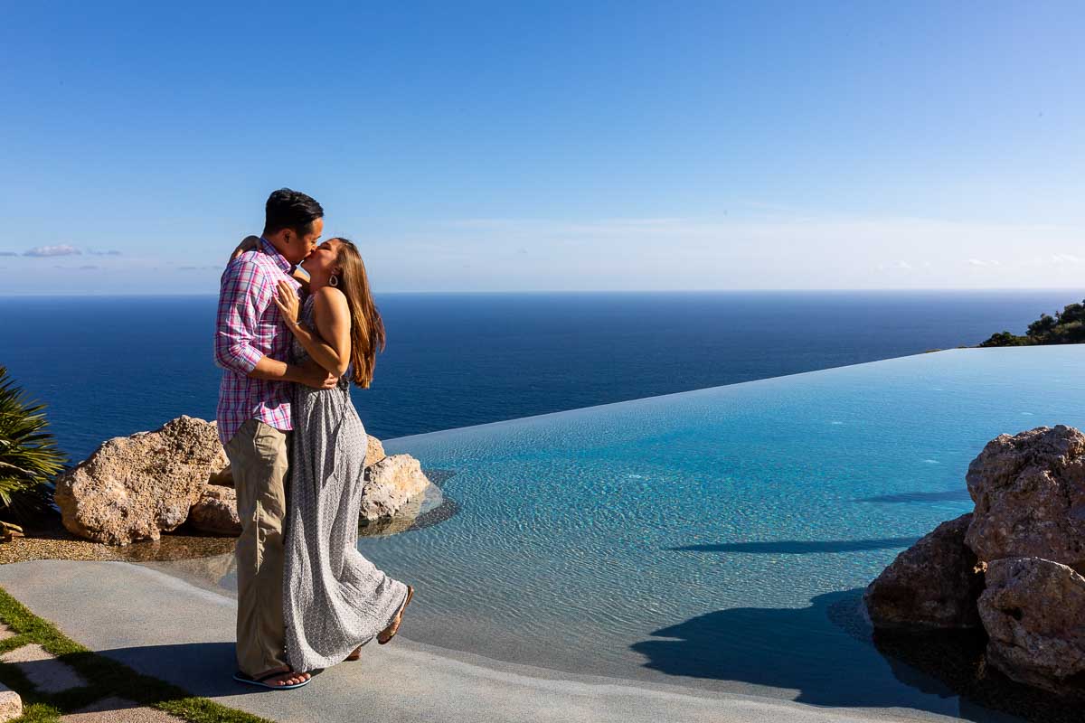 Jumping for joy during and engagement session after a surprise proposal 