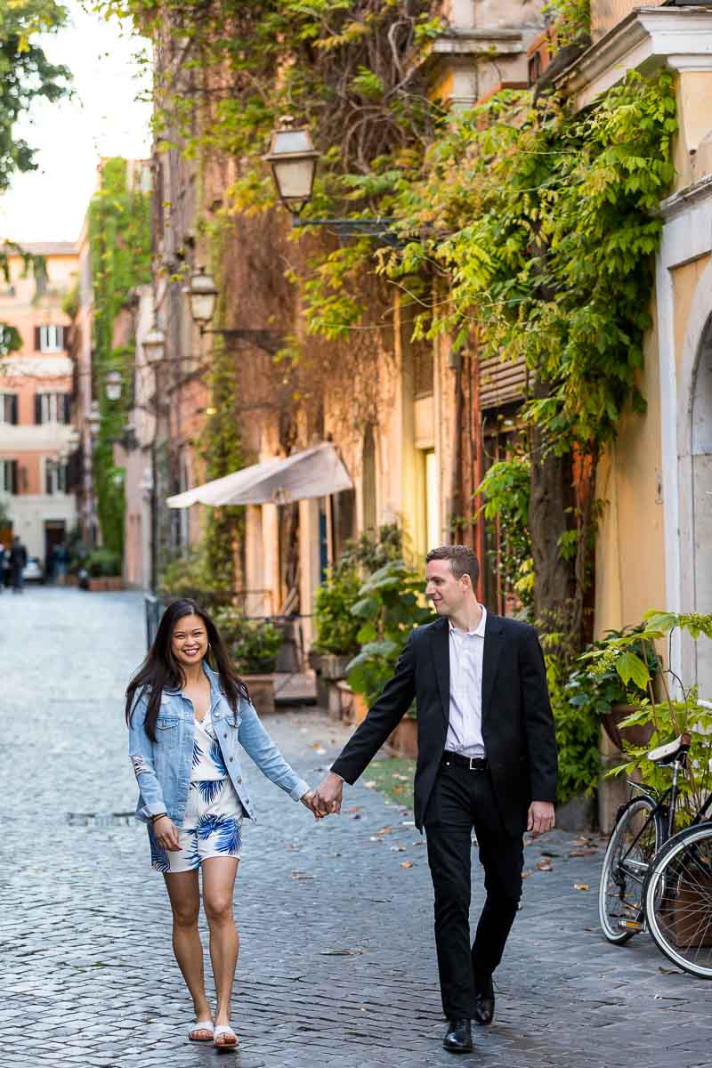 A nice walk on in Rome's via Marghutta cobblestone roman alleyways