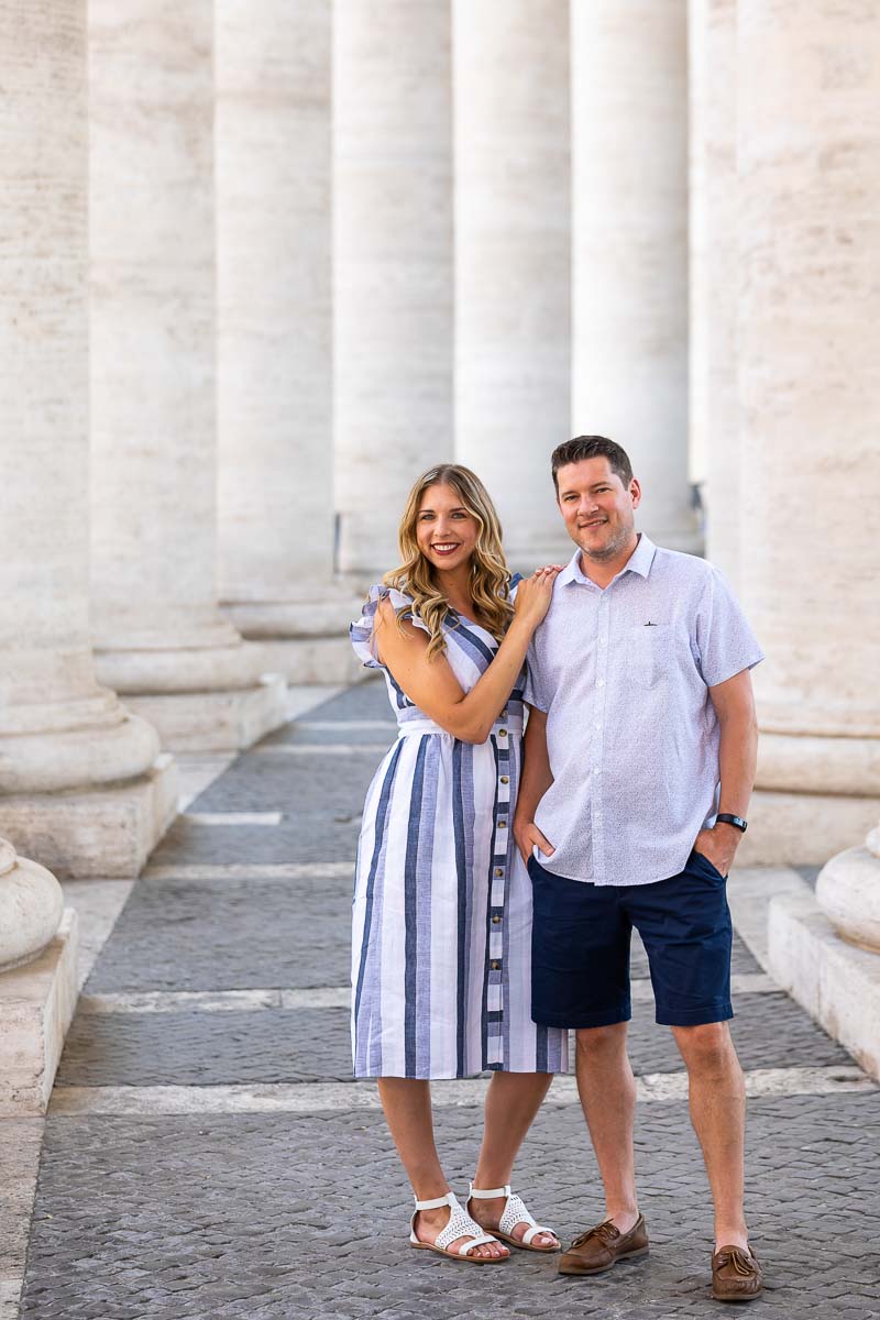 Portrait posing under the large columns in Saint Peter's square in the Vatican Rome Italy