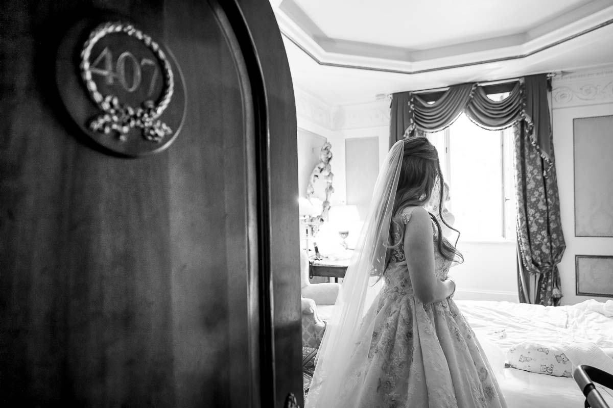 Exiting the hotel room to head out to the wedding ceremony