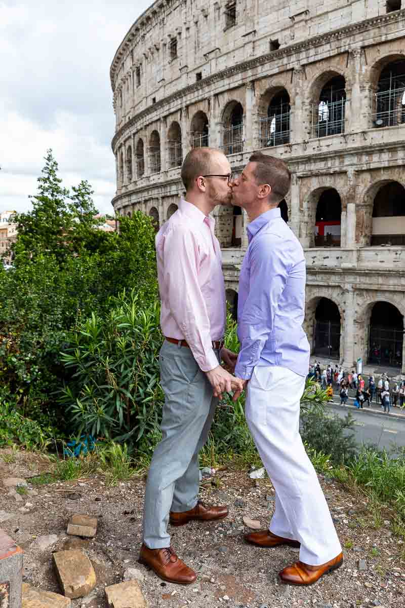 LGBT couple just engaged at the Roman Coliseum