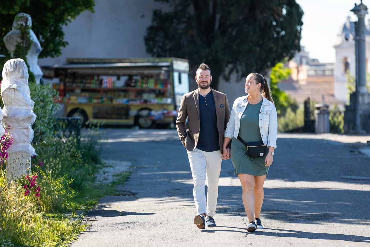 Couple walking away in bliss after a destinatnion engagement