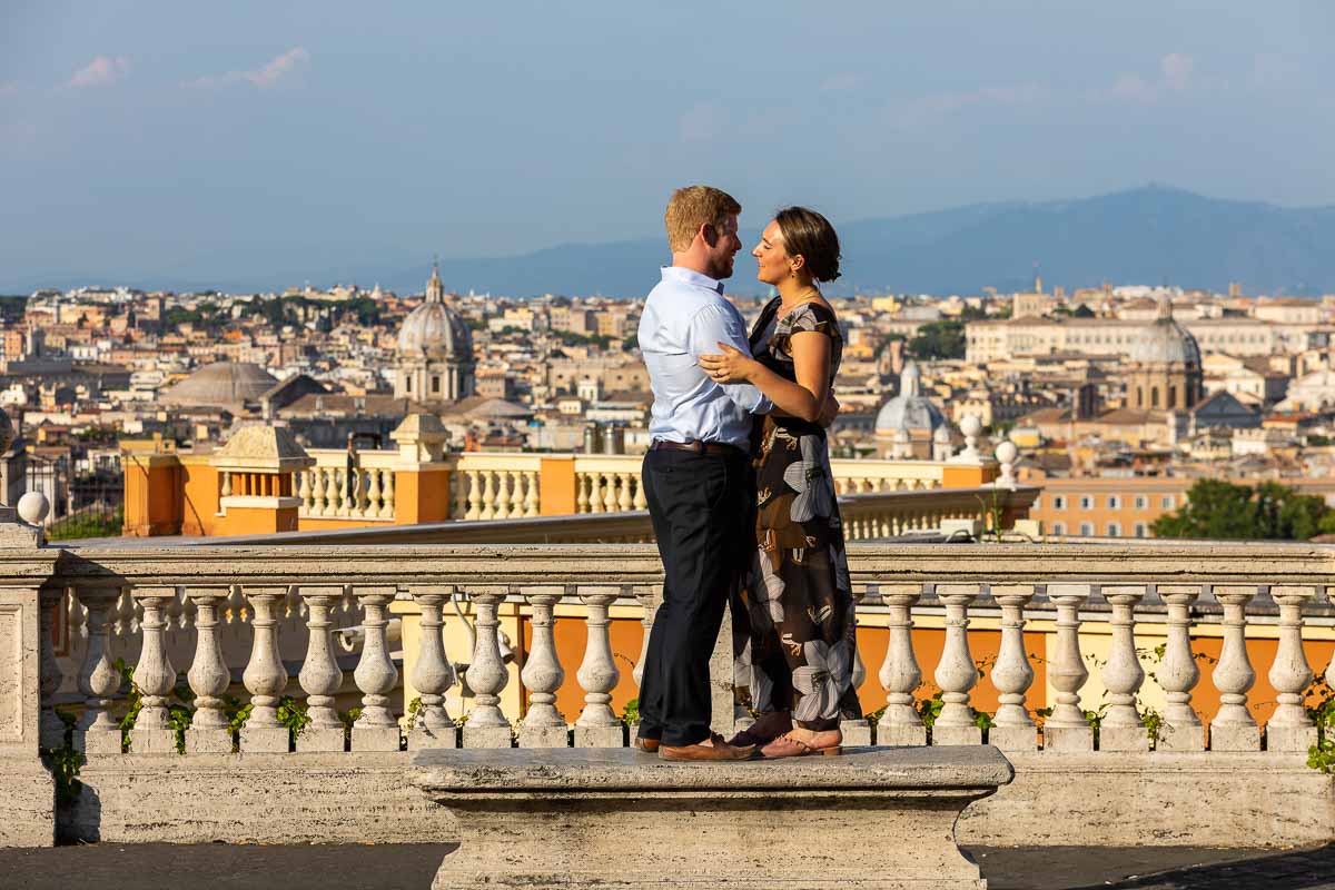 Standing on a marble bench before the beautiful roman scenery view