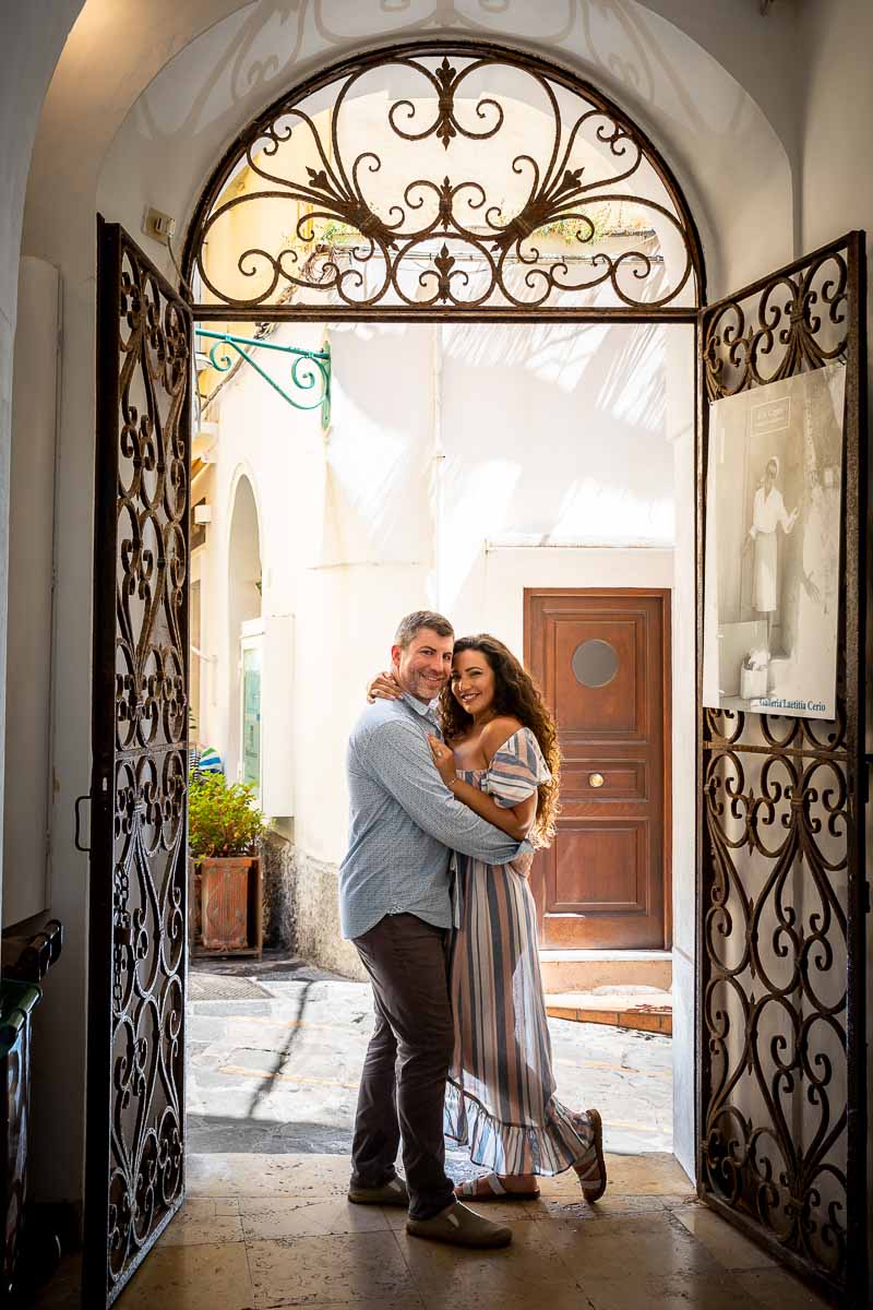 Couple portrait picture with special external lighting taken in front of a nice doorway