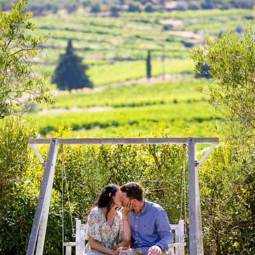 Couple kissing in Italian tuscany countryside