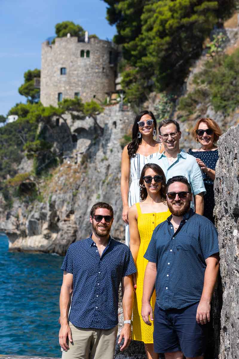 Family posed on different steps