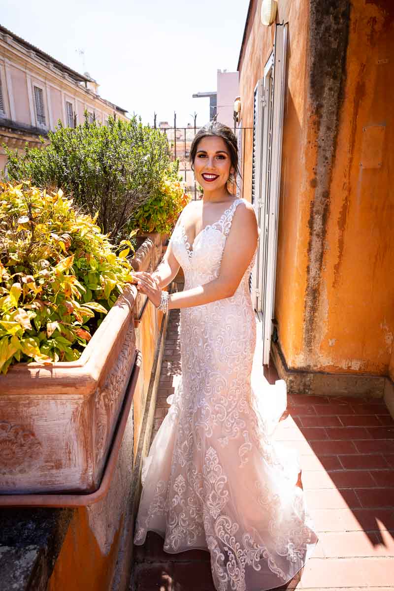 Bride full view on the hotel balcony