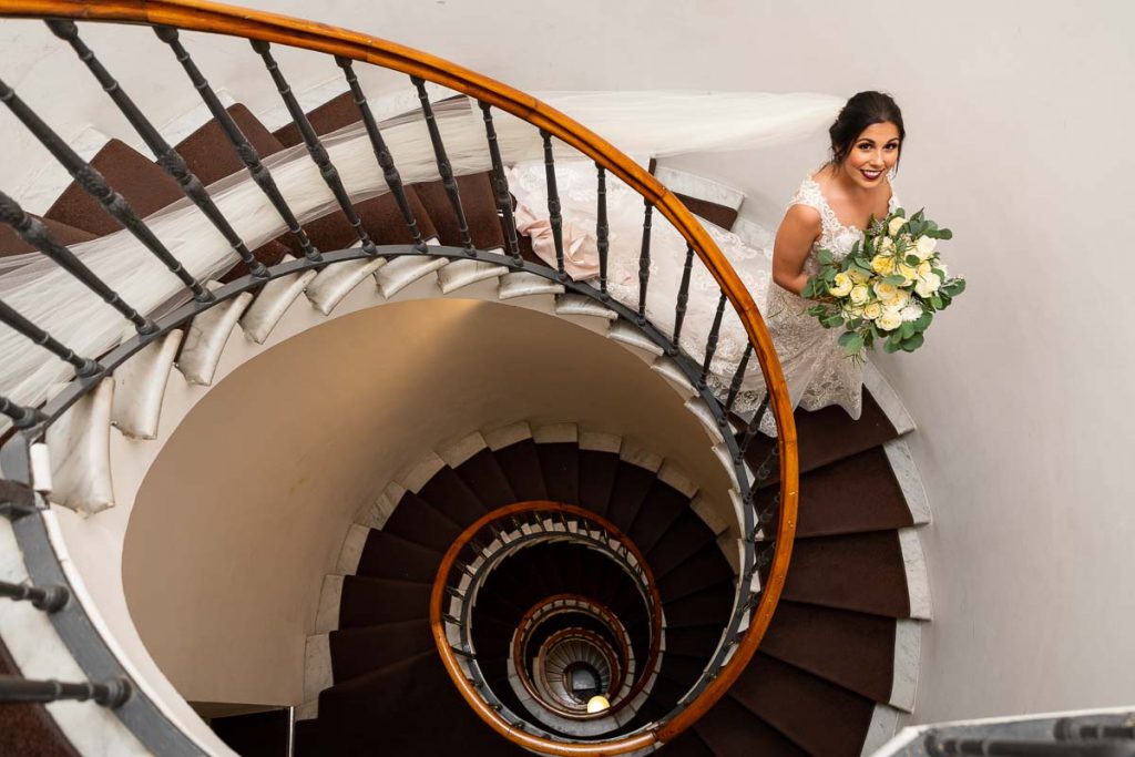 Bridal portrait taken on the spiral steps contained within the hotel
