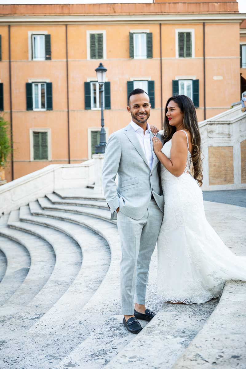 Close up portrait of the groom standing next to the bride during a photo session in Piazza di Spagna staircase