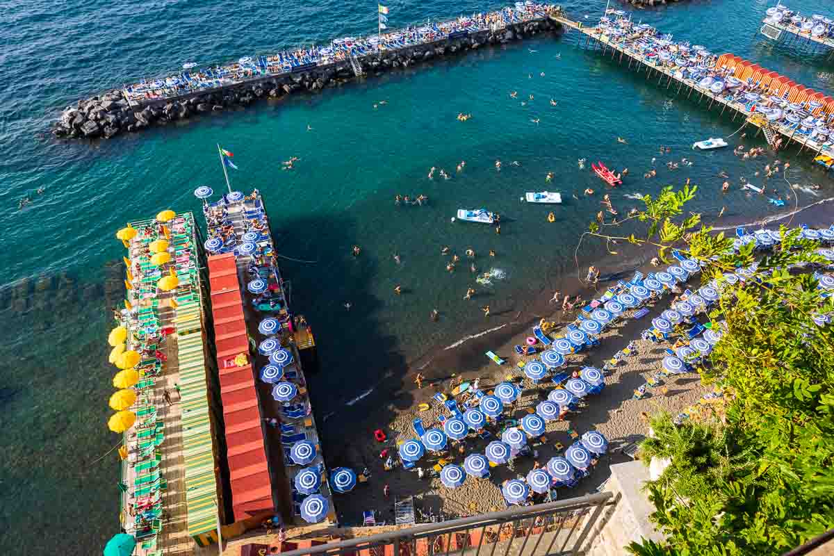 Seaside beach resort from the Sorrento coast photographed from above showing the multiple colors of the sea