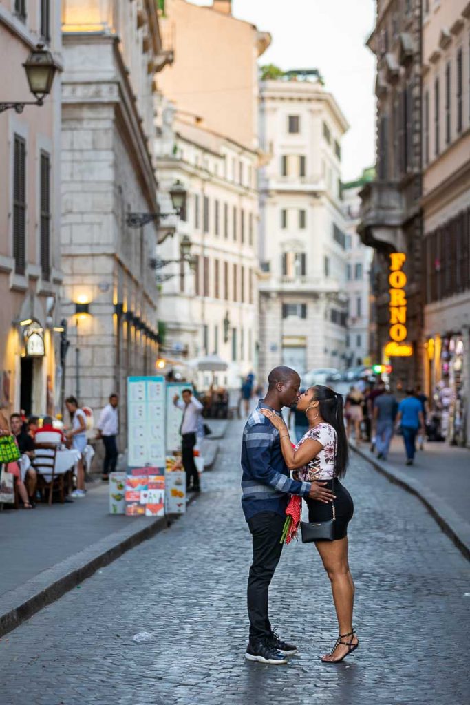 Roman cobblestone alleyway street couple photoshoot at dusk