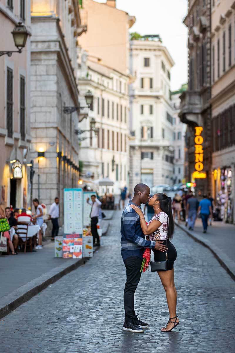 Roman cobblestone alleyway street couple photoshoot at dusk