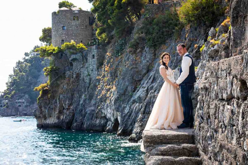 Amalfi coast wedding photoshoot by the Andrea Matone photography studio. Photo taken on the Positano beach side marina