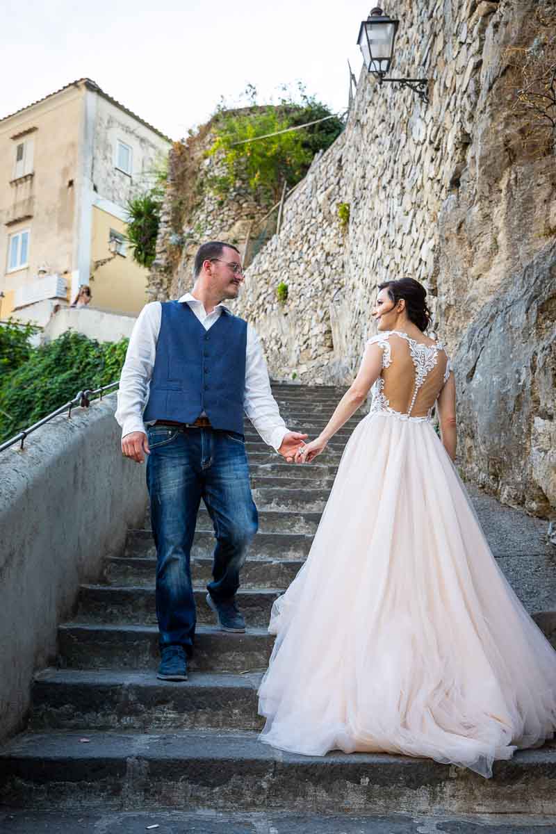 Walking up and down stairs during a wedding photoshoot in Italy