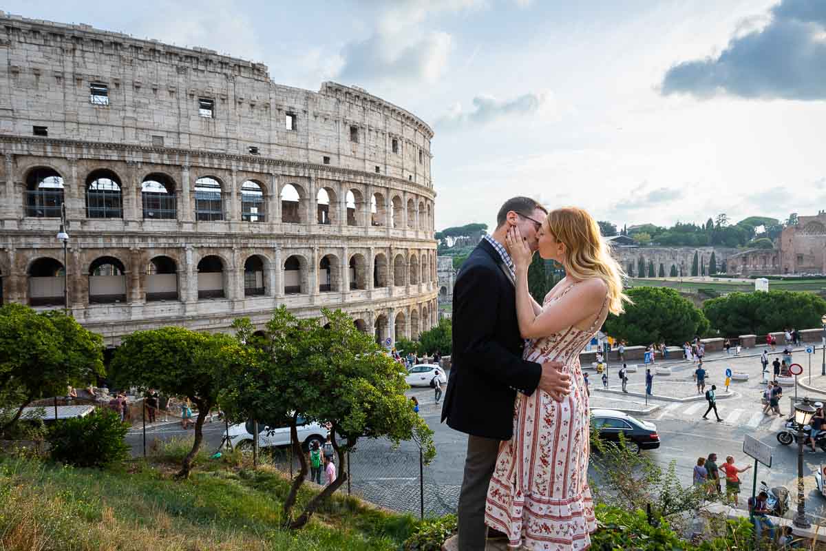 Couple kissing at the Coliseum