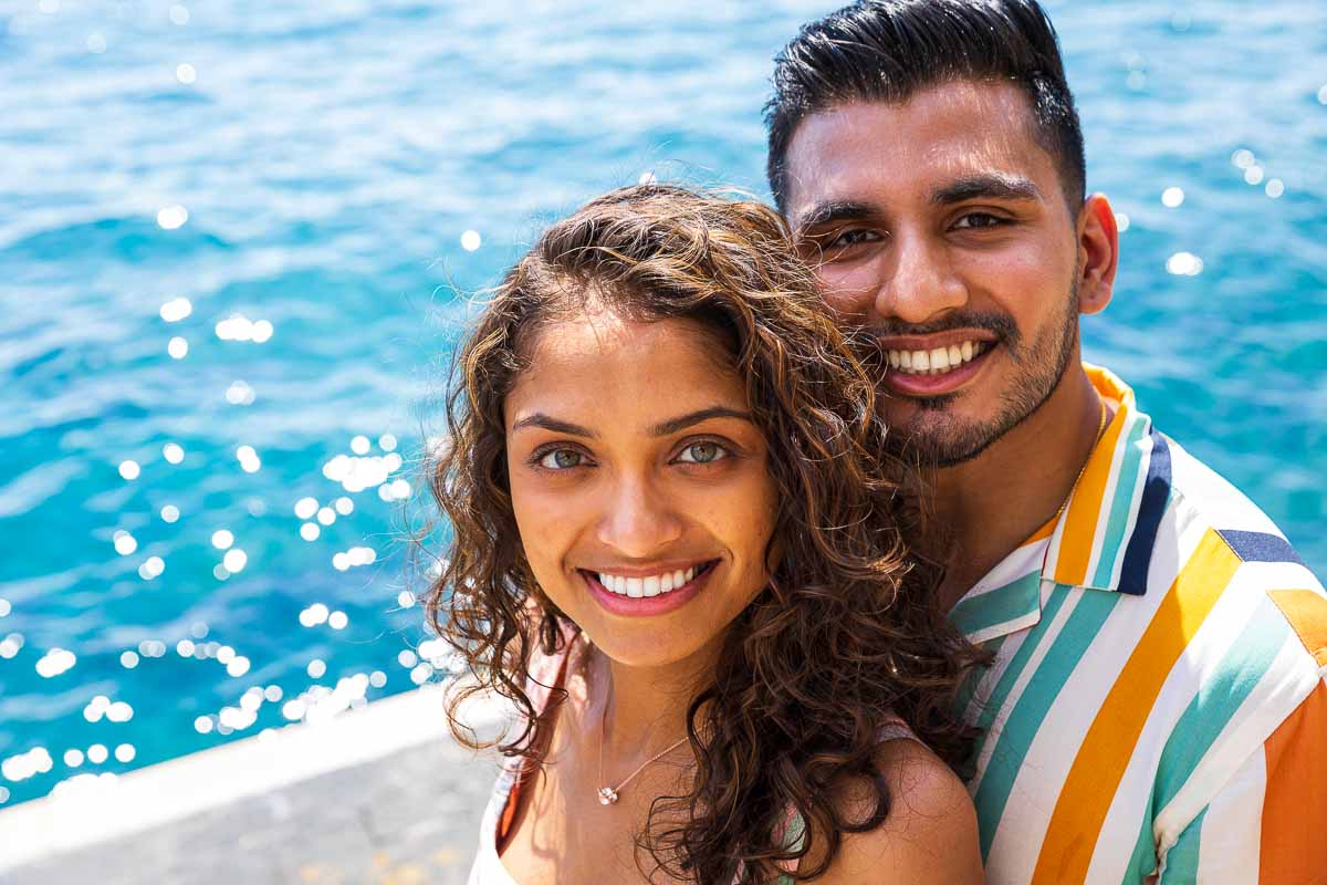 Couple portrait picture facial close up smiling and looking back