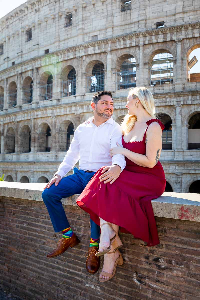 Sitting down portrait before the Roman Colosseum