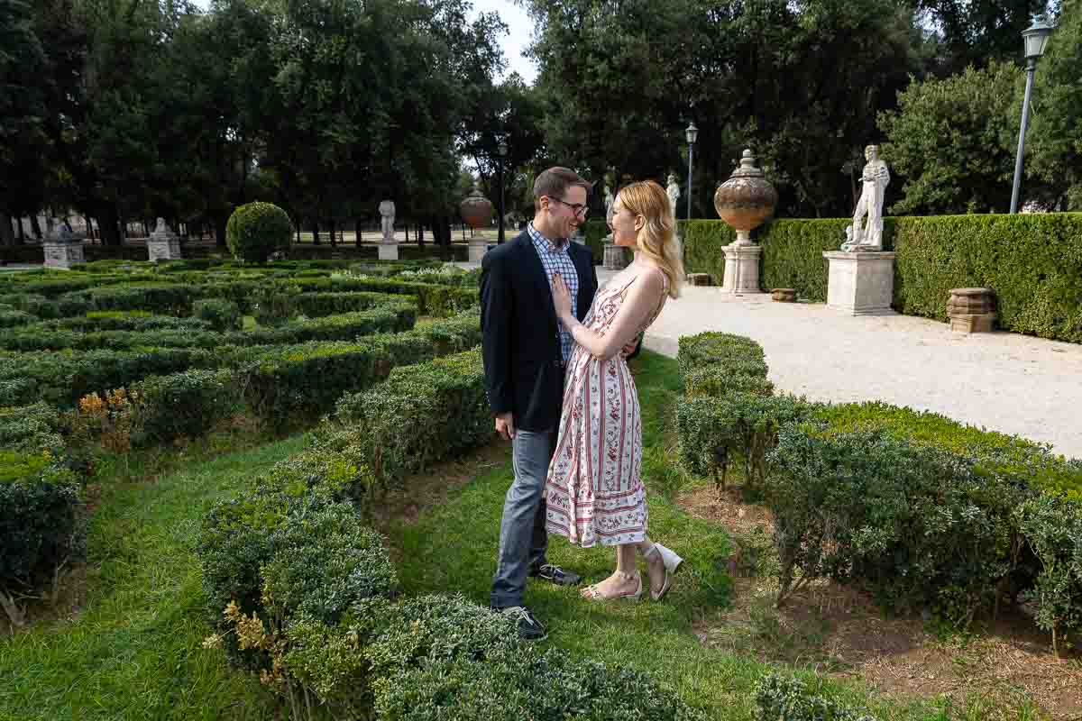 Couple posing during a photo session in the Villa Borghese gardens in Rome