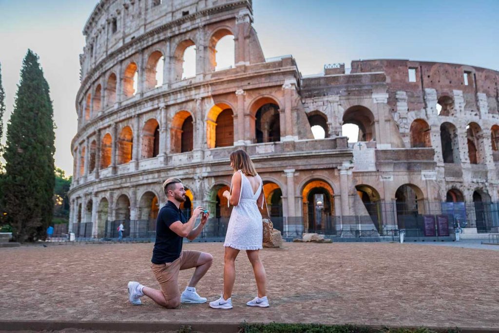 Asking the BIG question Marriage wedding proposal at the Roman Colosseum in the early morning