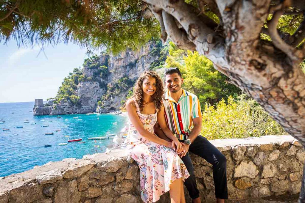 Portrait sitting down next to one another on the Amalfi coast in Italy