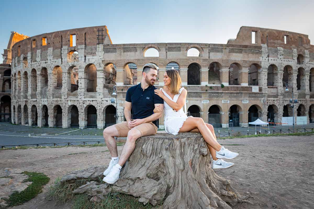 Sitting down engagement photo session in front of Rome's most iconic monument