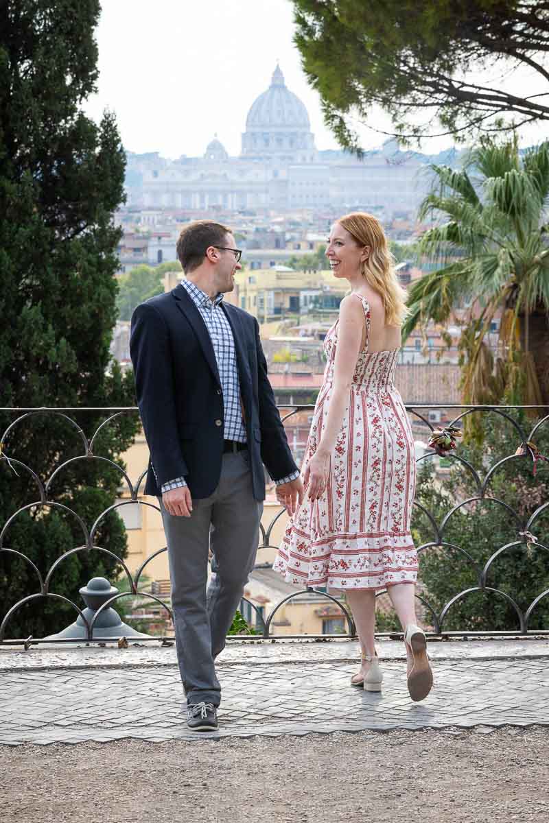 Running into each other posed photo shoot in the Rome streets of Pincio park