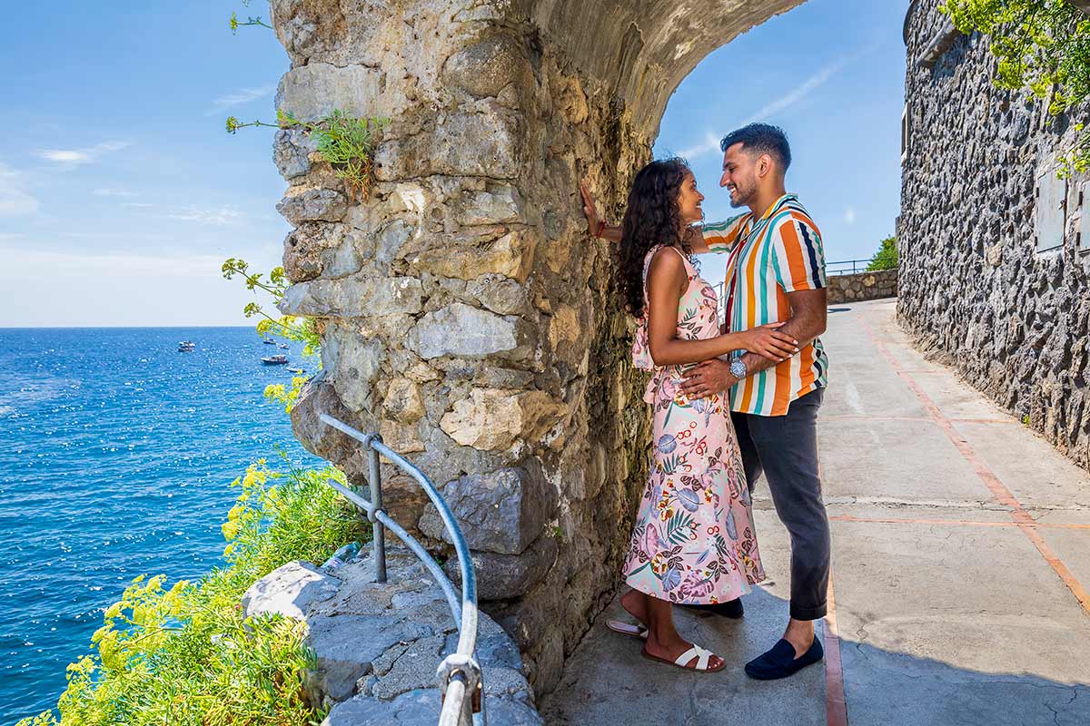 Couple posing during photoshoot in Positano