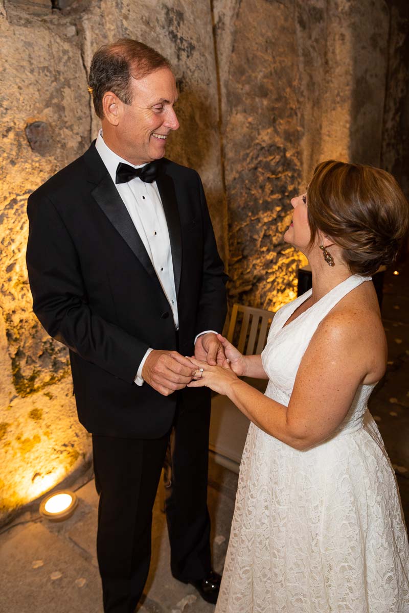 Exchanging wedding rings during a symbolic marriage ceremony 