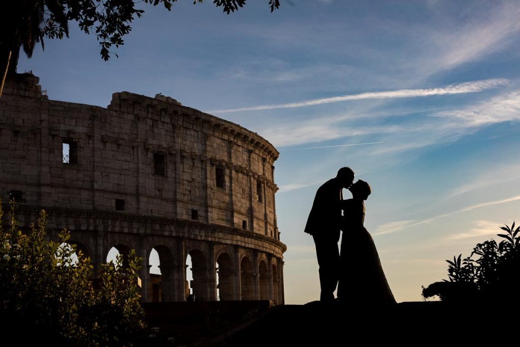 Elopement Wedding PhotoShoot in Rome Italy. Silhouette image taken at the roman coliseum