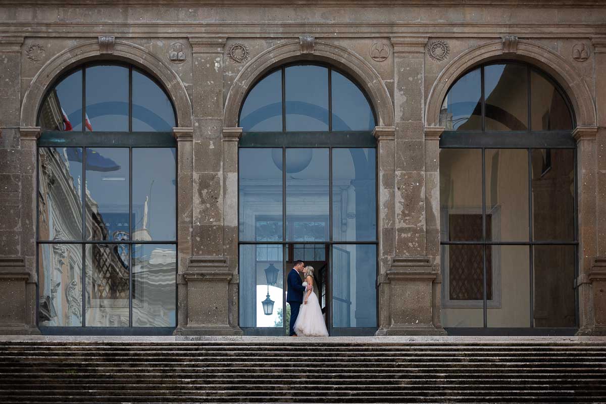 Picture taking on top of the Piazza del Campidoglio staircase posed at the entrance