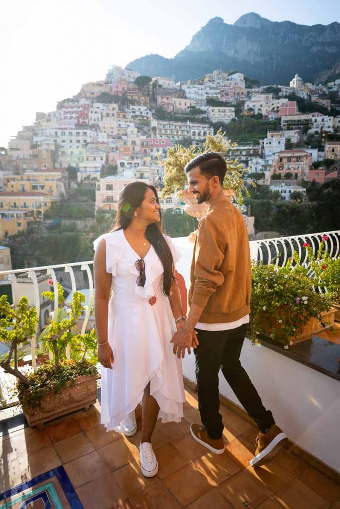 Posed photo of a newly engaged couple looking at each other