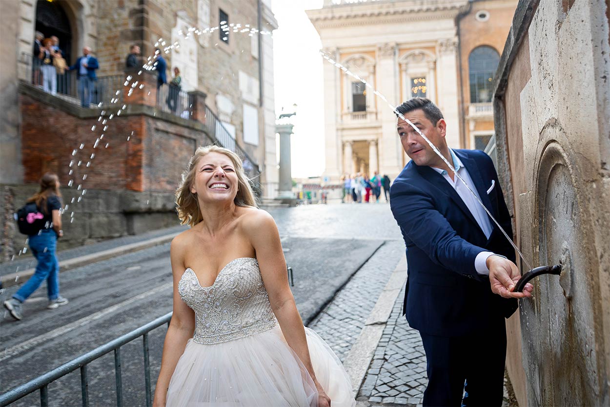 333 Bride walking under water fountain jet