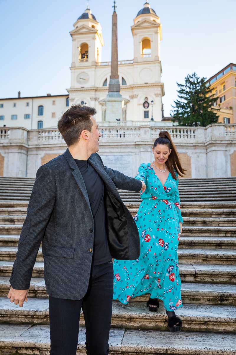 Walking down the Piazza di Spagna staircase while holding hands