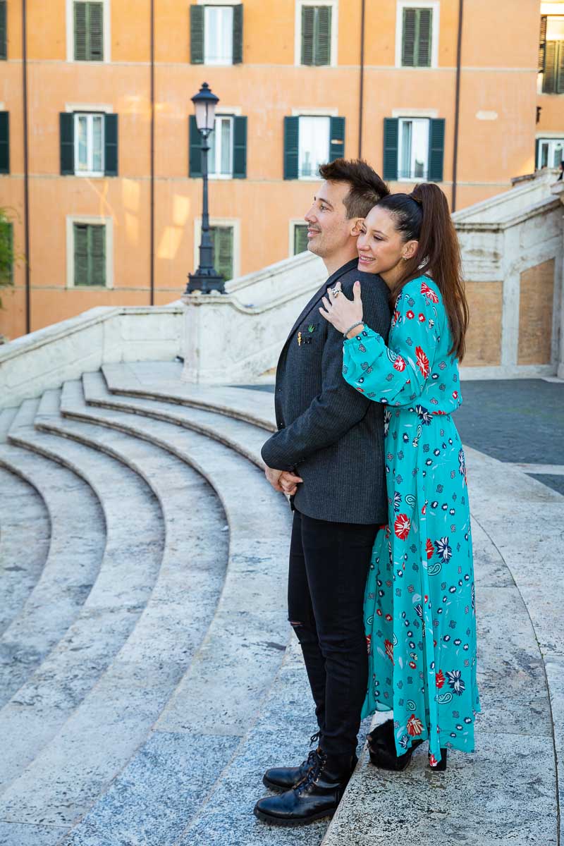 Sideway couple portrait photographed with the staircase geometrical lead away lines 