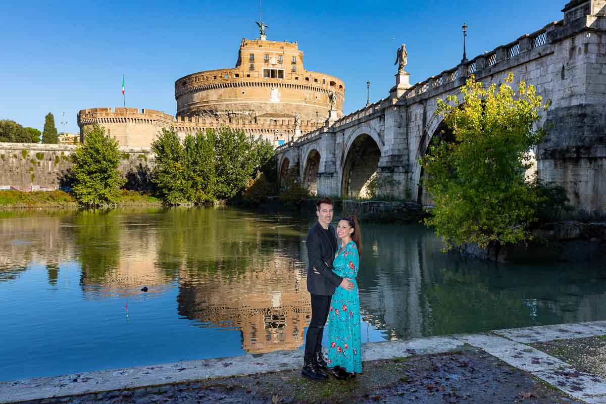 Couple portrait taken below the bridge at Castel Sant'Angelo next to the Tiber river