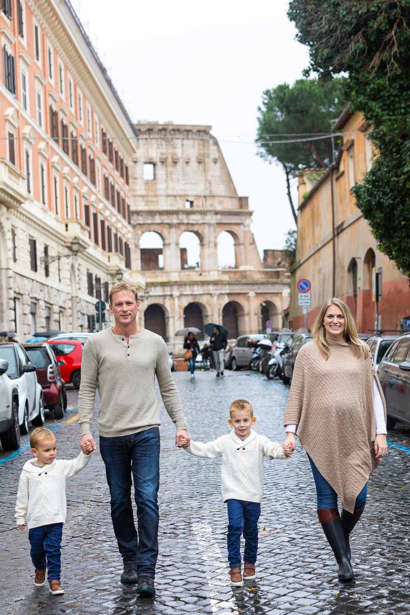 Walking together and holding hands with a very unique and incredible monument in the background 