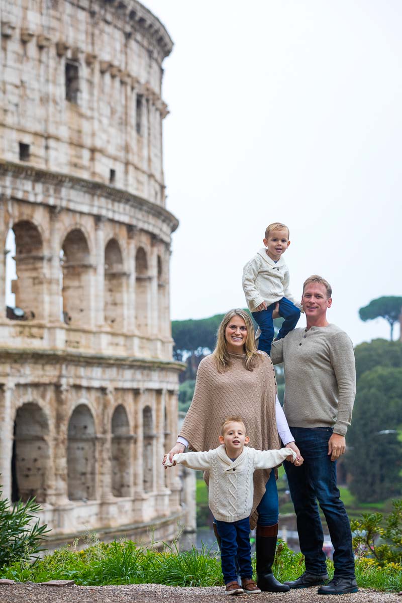 Family portrait picture taken at the Roman Colosseum 