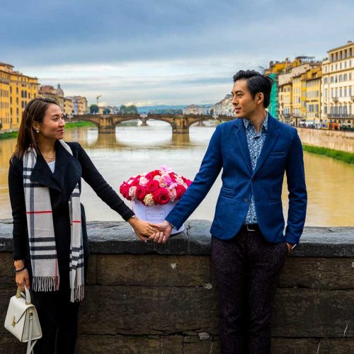 Engagement couple photoshoot in Florence over the Arno river in Italy