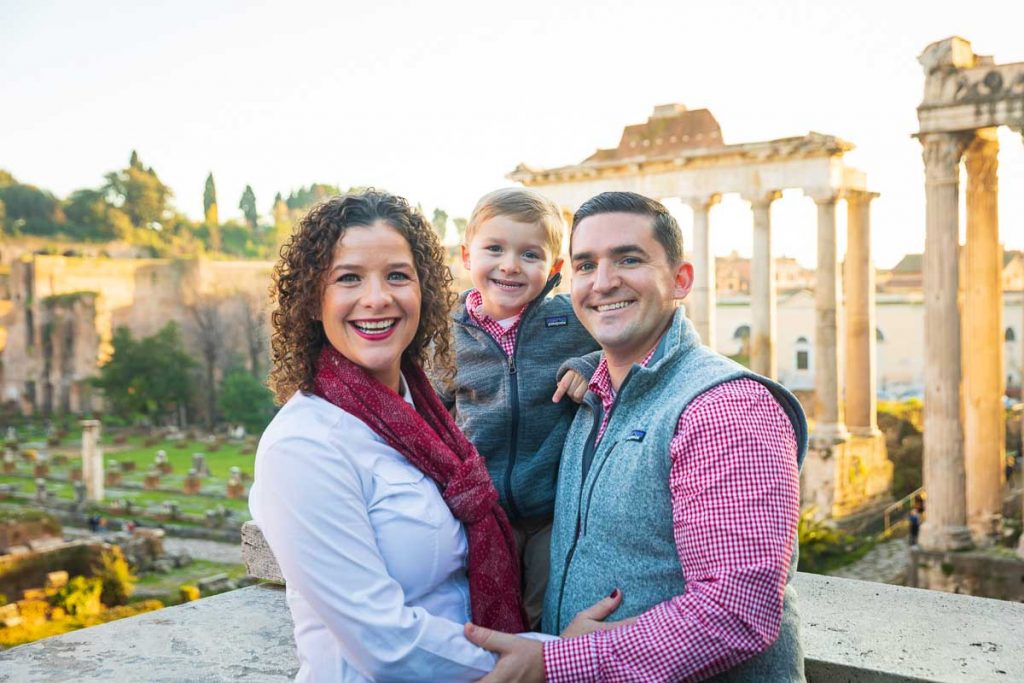 Closeup family photography in Rome using the ancient roman forum as backdrop