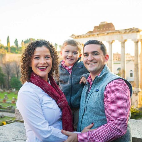 Closeup family photography in Rome using the ancient roman forum as backdrop