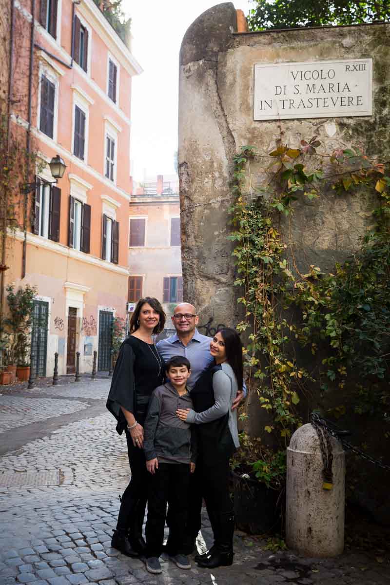 Family photography from Rome's Trastevere quarter in very typical cobblestone alleyways