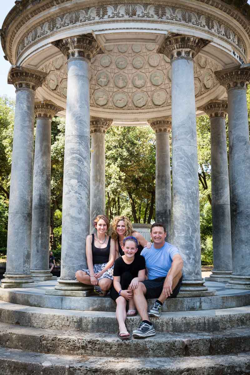 Sitting down portrait picture on the steps of Diana's Temple in the Villa Borghese park