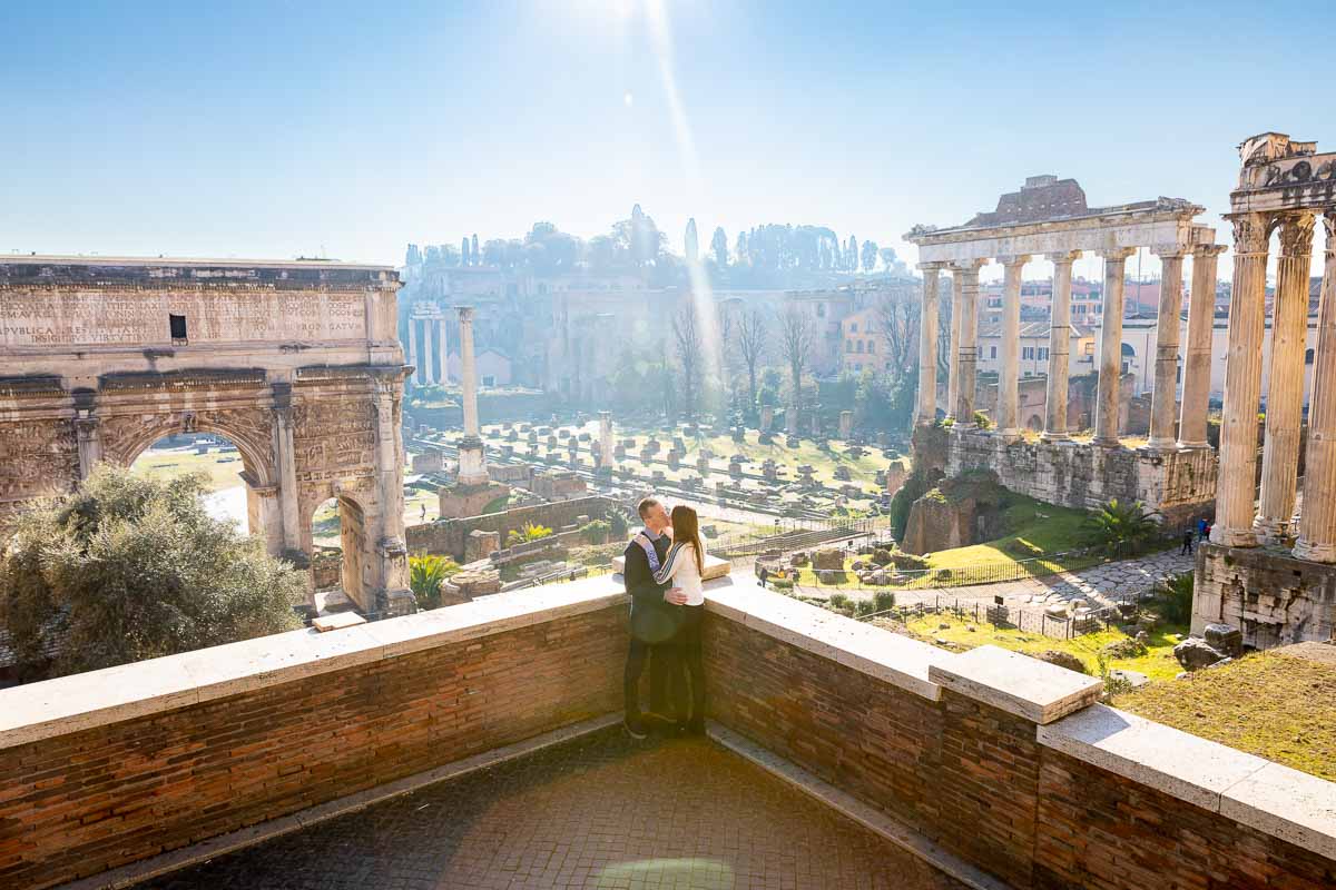 Standing before the ancient city of Rome viewed from the above Campidoglio square