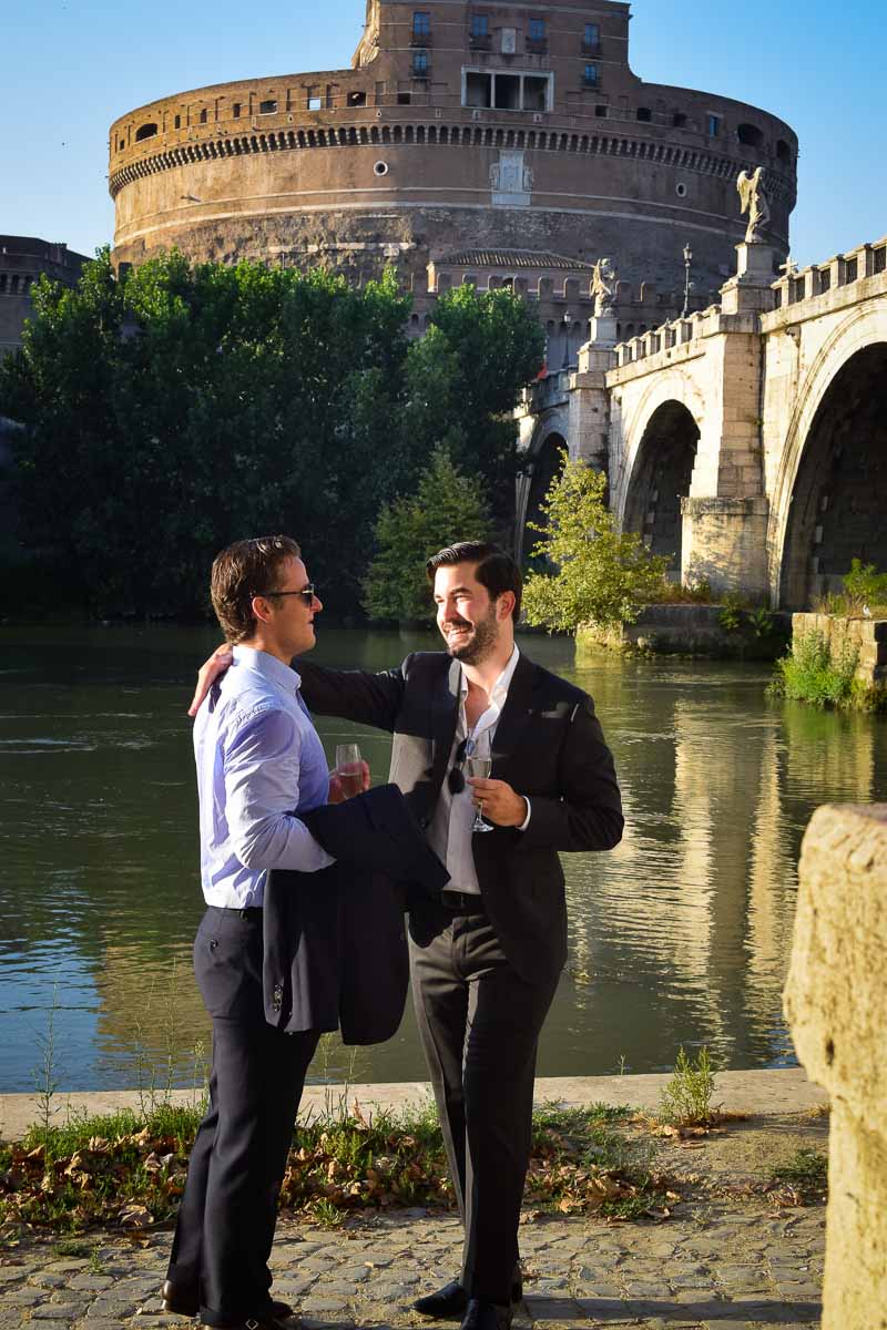 Celebrating together the engagement while toasting with a sparkling wine 