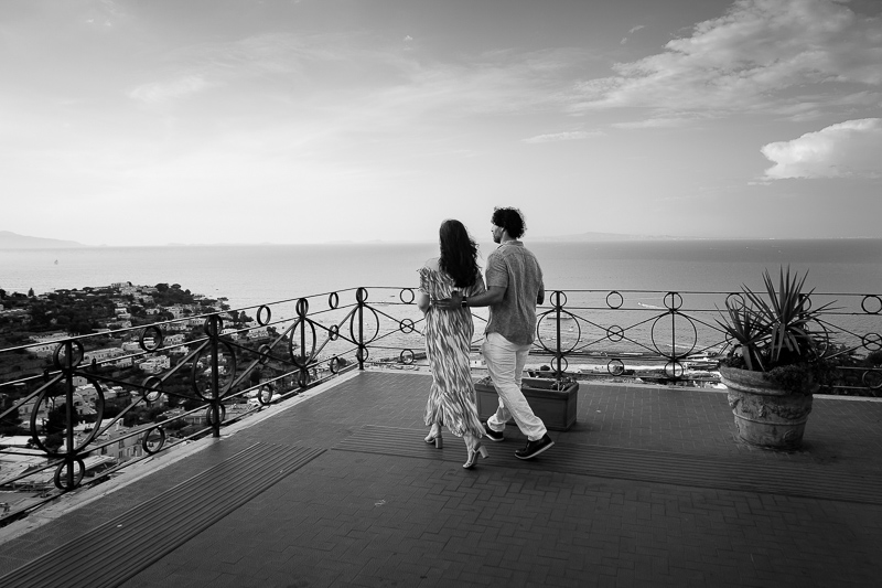 Walking together in black and white photos reaching the terrace balcony