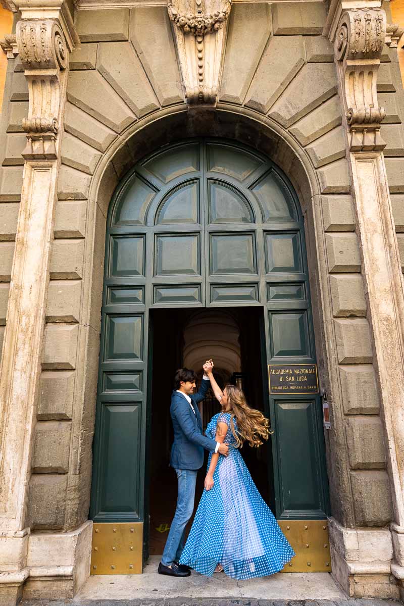 Improvised dancing in front of a typical roman doorway during a photography session